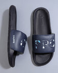 Top-down view of navy Drip sliders with tone-on-tone streetwear design