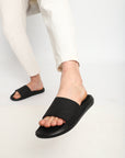 Men styling Chupps Pure Black Sliders with casual white trouser