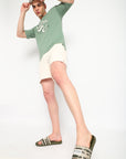 Men styling Chupps Traction Olive Green Sliders with casual beach outfit