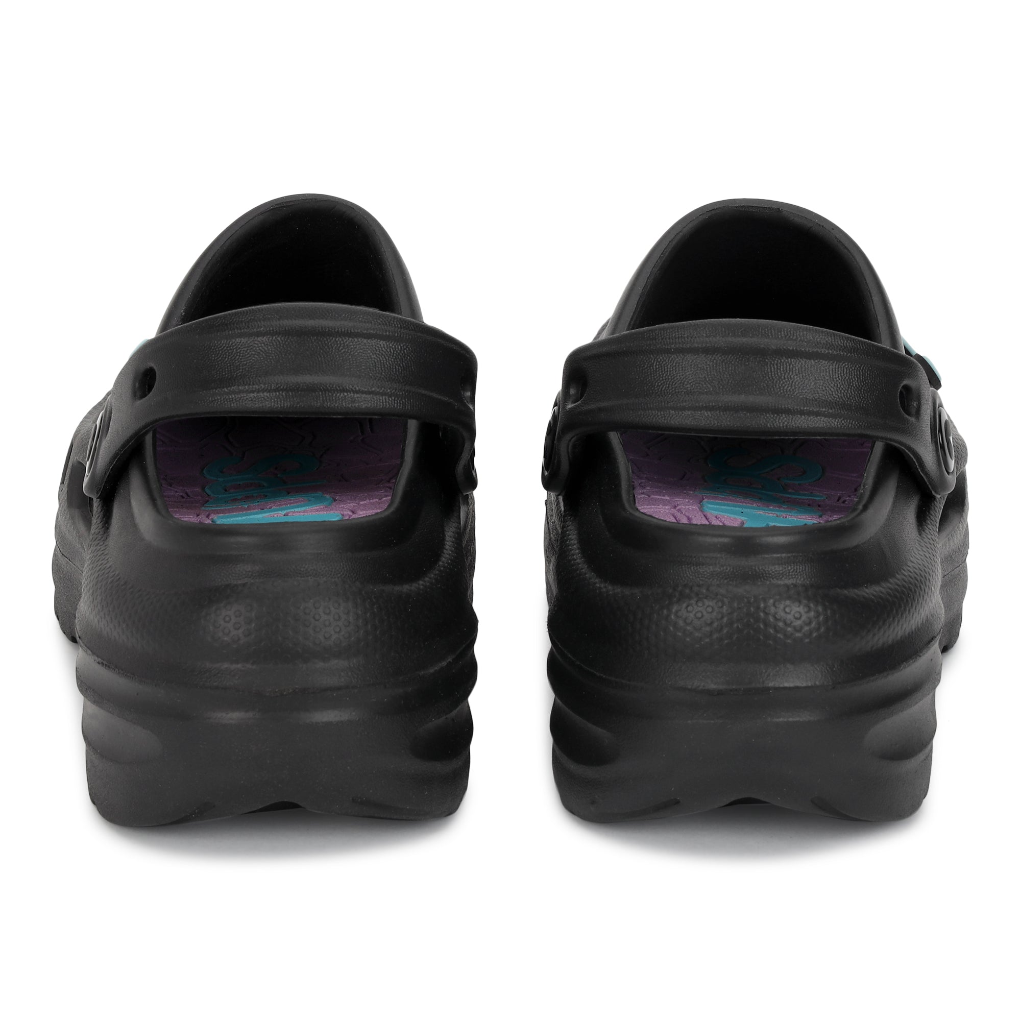 Black clogs  with velcro straps on a white background