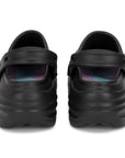 Black clogs with velcro straps on a white background