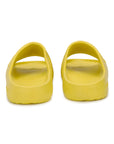 Foot POV of yellow Chupster on a white background