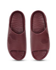 Pair of maroon Chupster with textured pattern on a white background