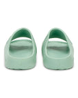 Pair of light green slides on a white background with true zero logo seen