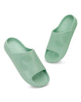 Dynamic view of Pista Green Chupster waterproof slider with open toe and sealed edges.