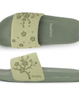 Side and top view of Pista Green sliders highlighting slim strap and minimal profile.