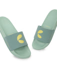 Pair of light green slides with yellow logo on a white background