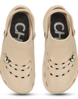 Beige clogs with black sole on a white background