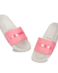 White slides with pink straps on a white background