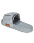Close-up of grey gathered ruffle texture on the Ruffel upper.