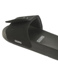 Side view of black sliders highlighting adjustable Velcro strap.