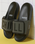 Chill Out black & grey sliders top view showing CHILL graphic upper and adjustable Velcro.