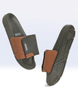 Solid Hues black tan sliders top view showing tan upper and black sole.