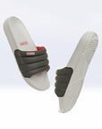 Side view of sliders showing quilted strap and ErgoX Plus sole