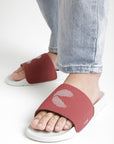 Close up of feet and dot fusion strap with light grey dotted 'c'pattern