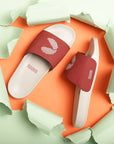 ErgoX contoured footbed texture on an orange background
