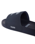 Close-up of strap showing footbed, Chupps and navy blue lining