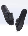 Dynamic view of navy blue camo sliders highlighting adjustable Velcro strap.