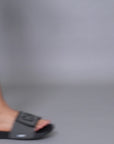 Chill Out black grey sliders — adjustable Velcro, FOAM6 padding, styled with denim and t-shirt.
