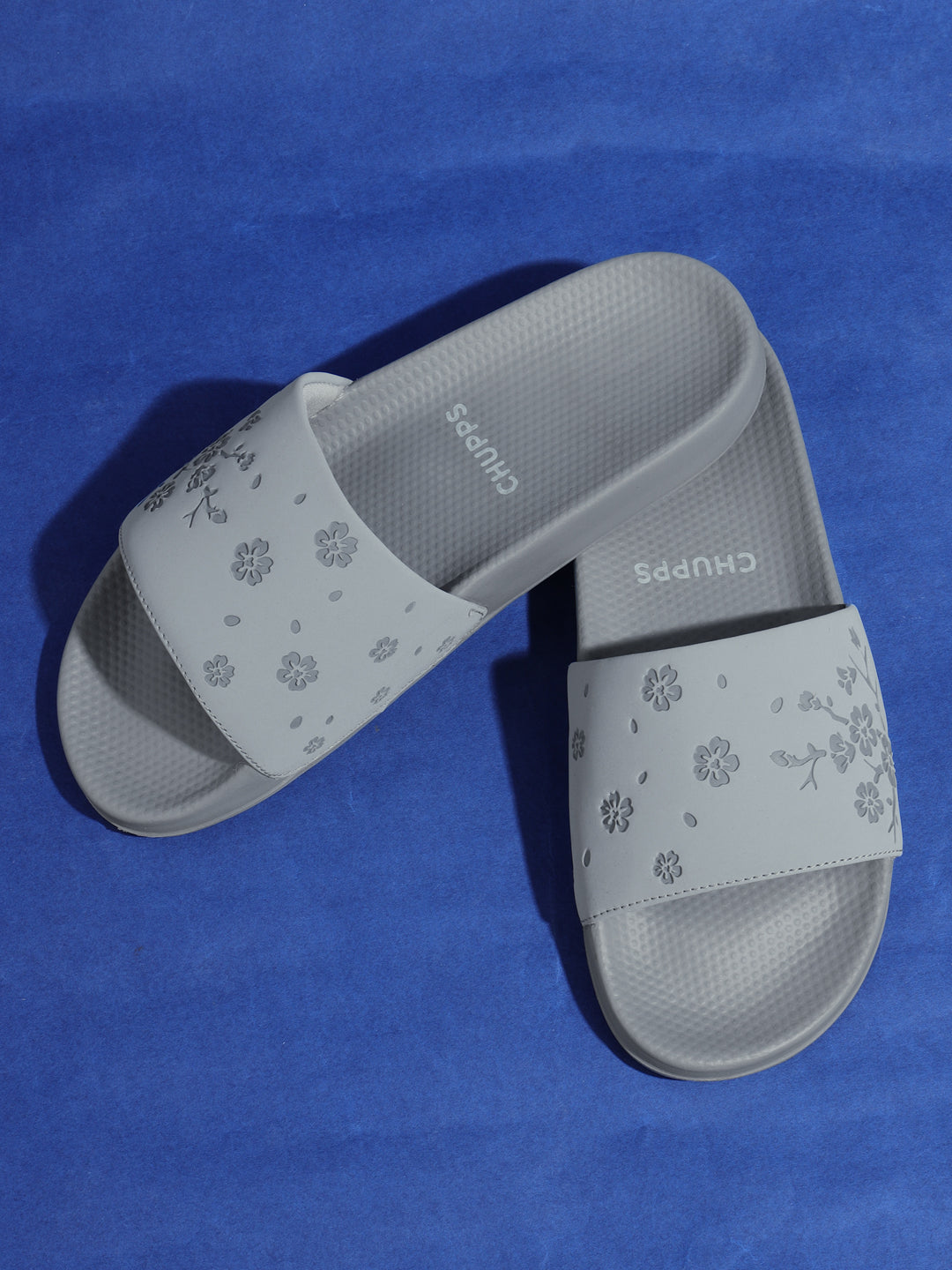 Hana grey sliders top view showing floral-embossed Ergo-Pro footbed.