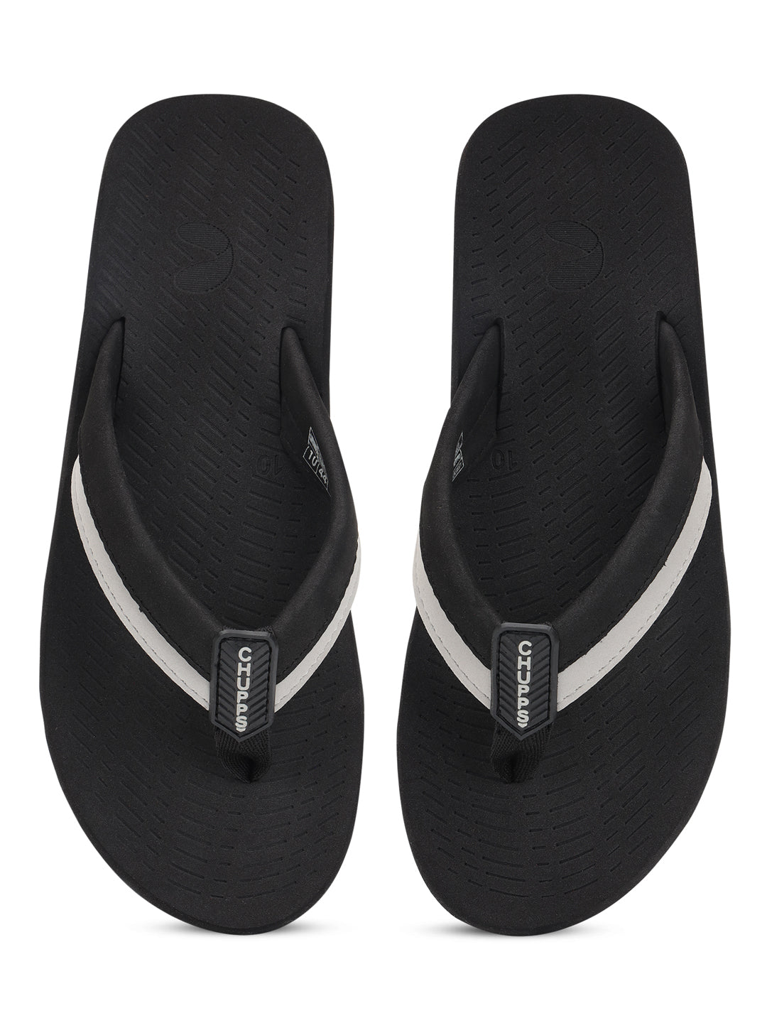 Holt sandals placed casually on a tiled floor
