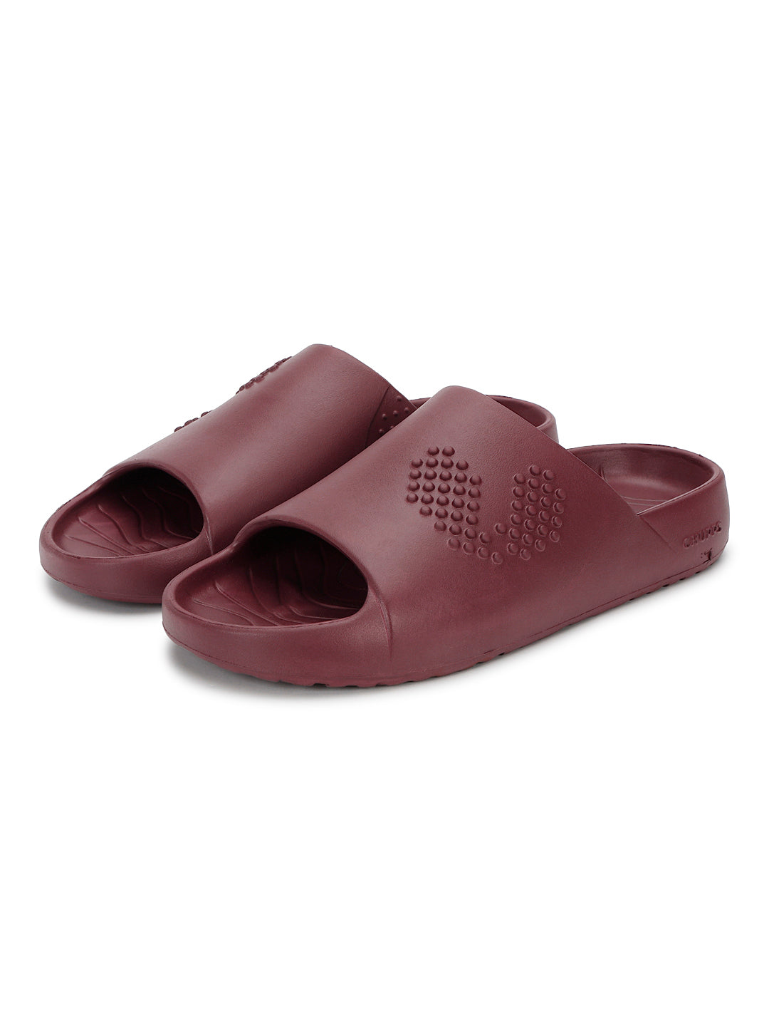Pair of maroon Chupster with dotted pattern on a white background