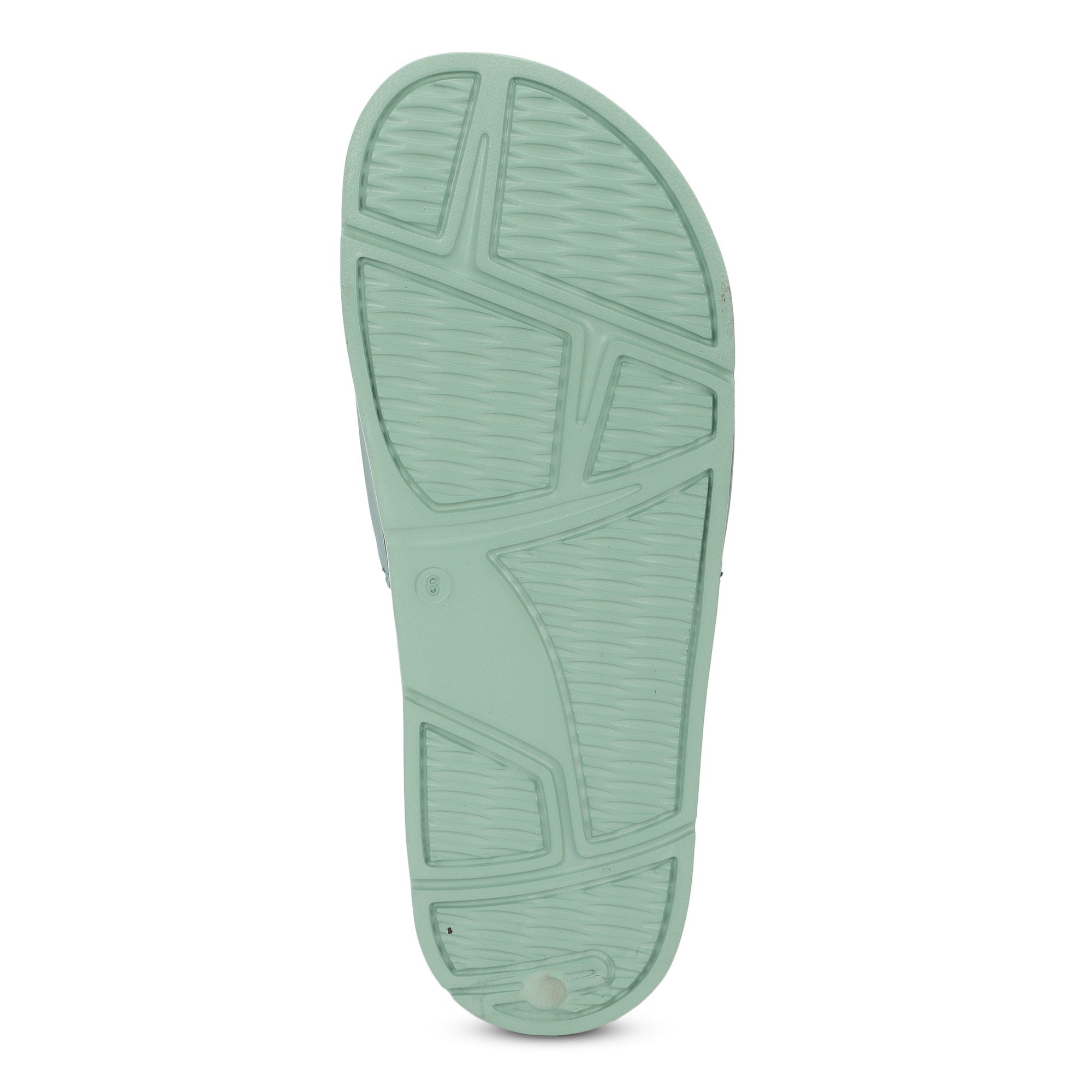 Close-up of a green sandal sole on a white background