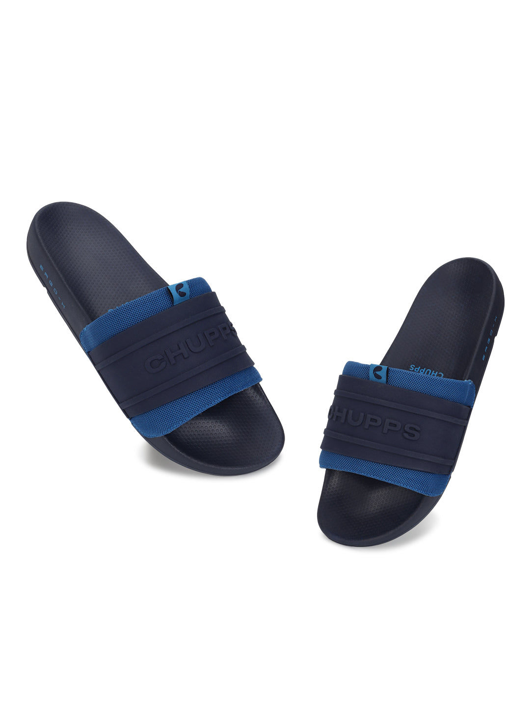 Sporty men’s sliders in blue with silicon embossed upper , a tilted picture 
