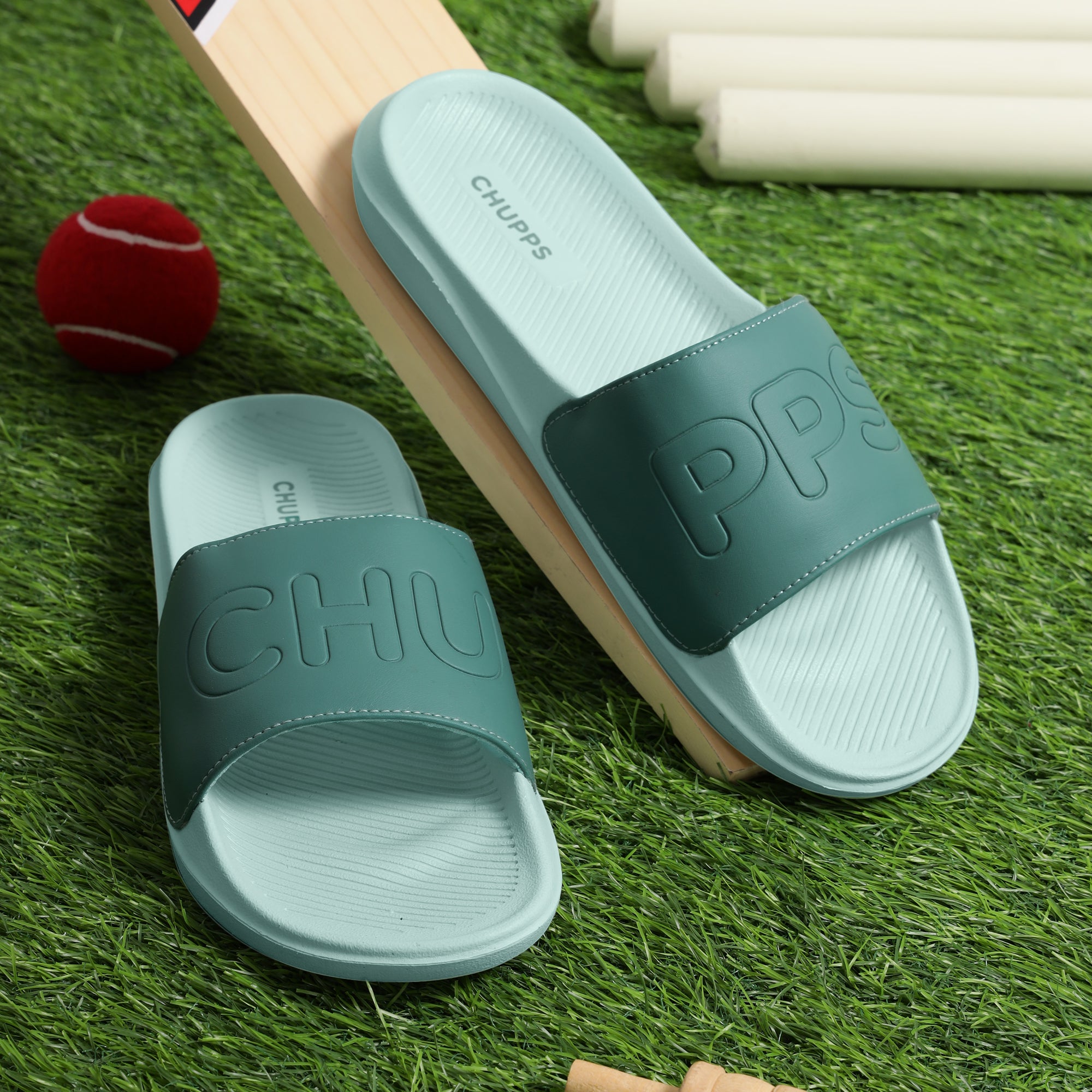 Lime green sliders for men with cushioned AirSoft Sole on a dark green background