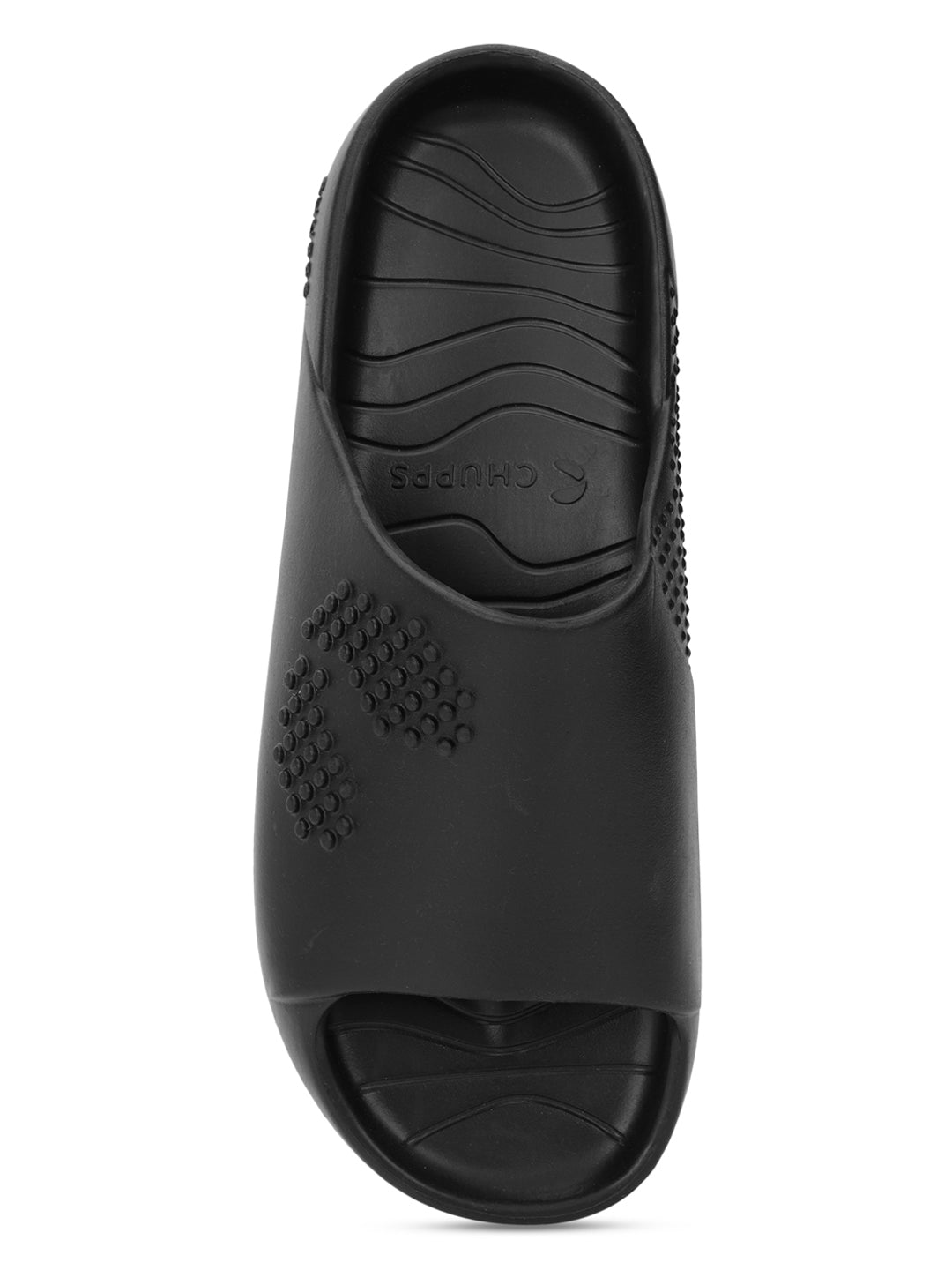 Black slip-on sliders with textured sole on a white background