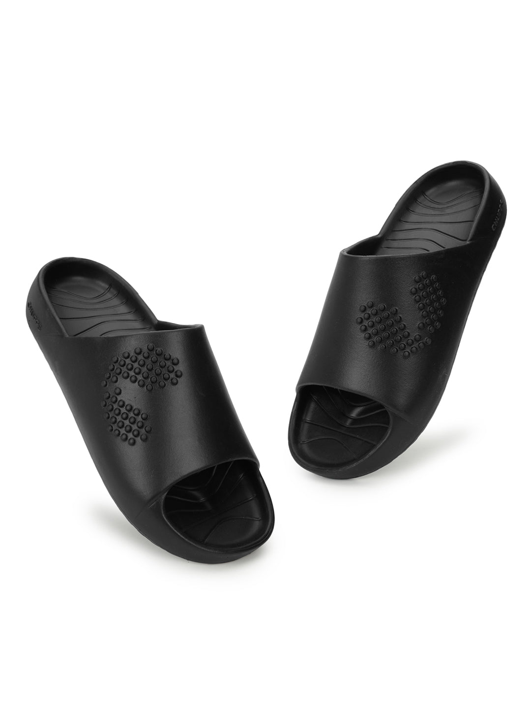 Close-up and tilted image  of men’s black chupster  resting in the deep footbed for everyday comfort