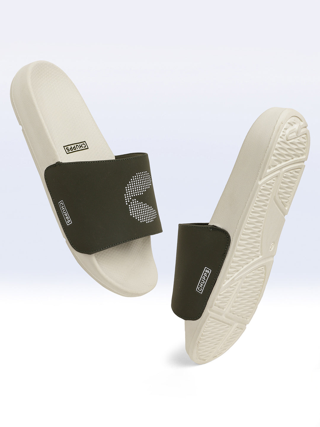 A pair of white and olive green sliders with  strap and the signature 'C' in dot pattern on the upper.