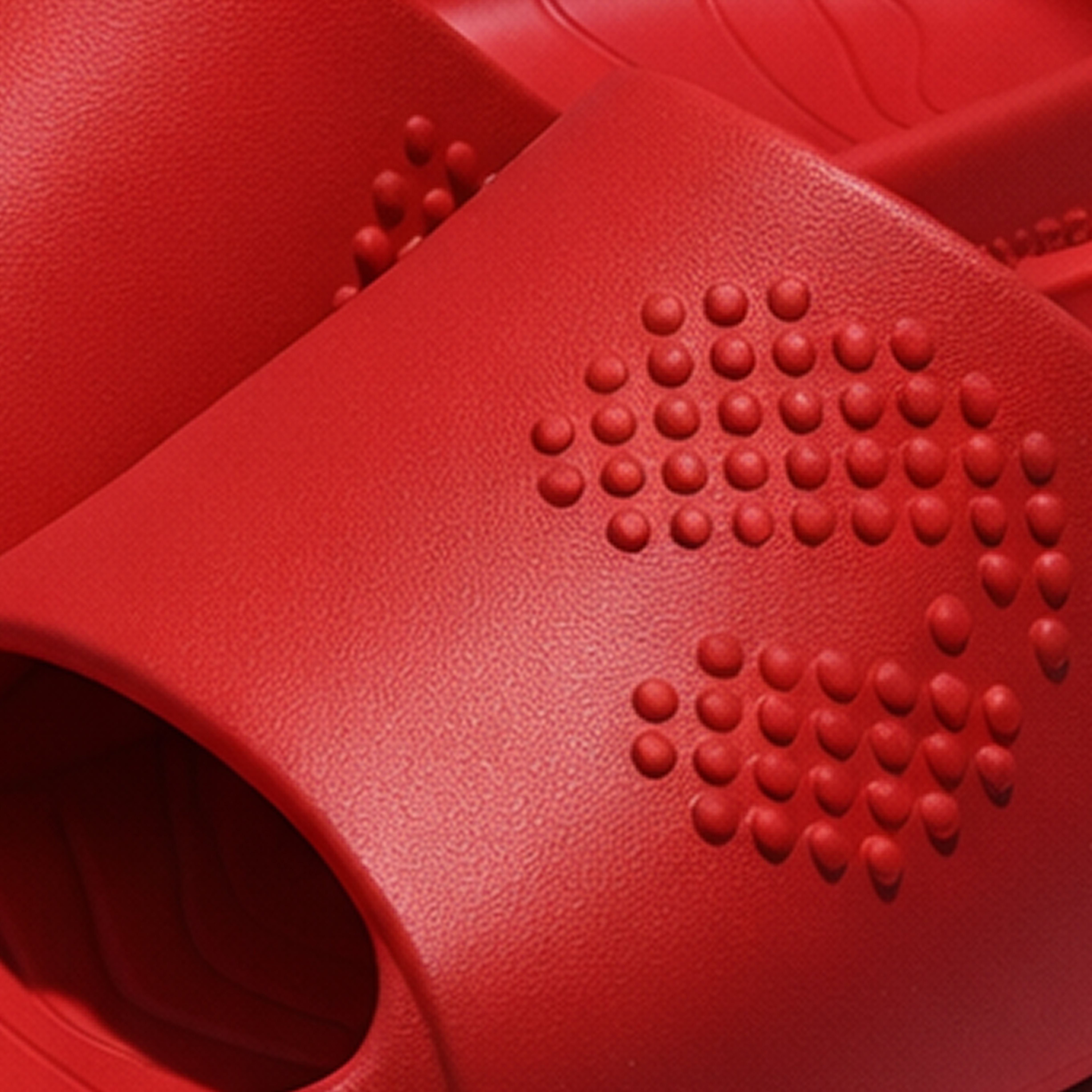 Close-up of red textured Bio-degradable Chuppster with a pattern